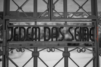 Evil: On the gate, facing inward: "To each his own."